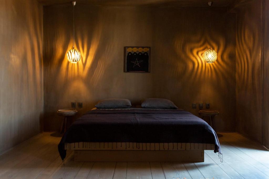 Postel nebo postele na pokoji v ubytování Life Gallery Hotel & Spa