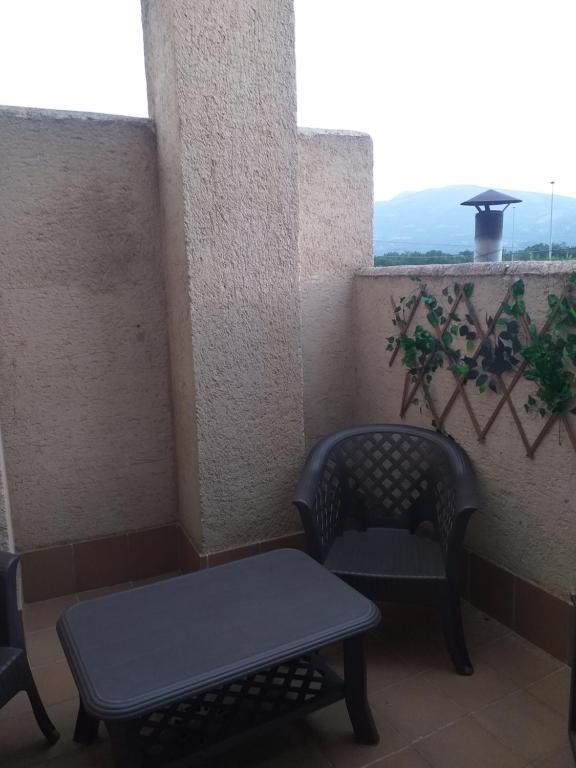 Balkón nebo terasa v ubytování El Mondalindo Habitación intima con patio