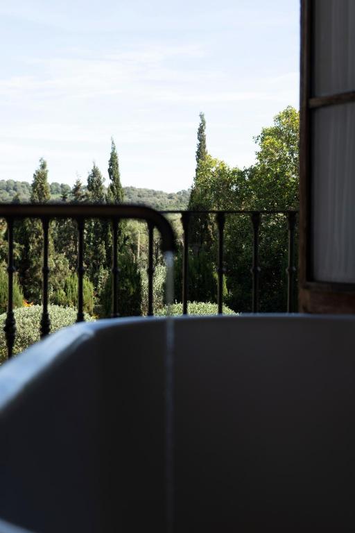 a view of a balcony with a view of trees at Casa La Siesta in Vejer de la Frontera