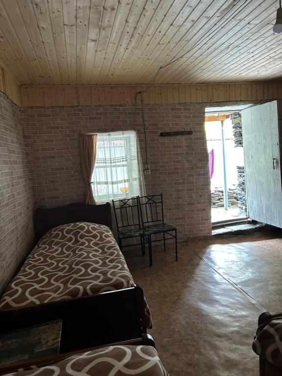Letto o letti in una camera di Shio's Stonehouse in Tusheti