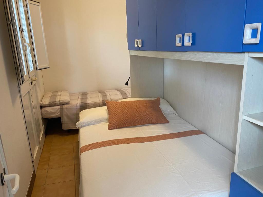 A bed or beds in a room at Casa versilia