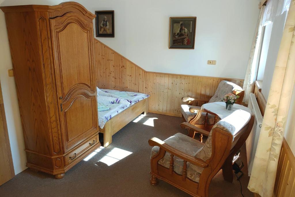 Postel nebo postele na pokoji v ubytování Penzion u Veselých