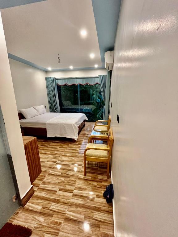 Postel nebo postele na pokoji v ubytování Phong Nha Moonlight Villas