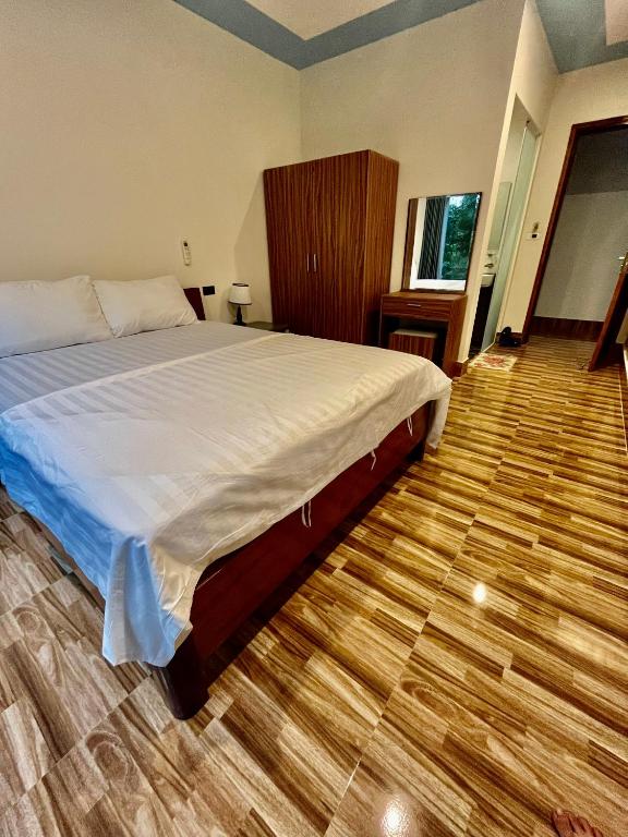 Postel nebo postele na pokoji v ubytování Phong Nha Moonlight Villas