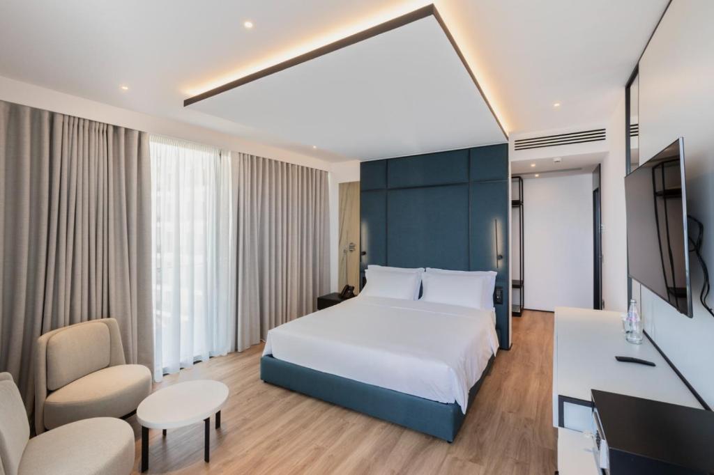 Postel nebo postele na pokoji v ubytování Mango Luxury Resorts