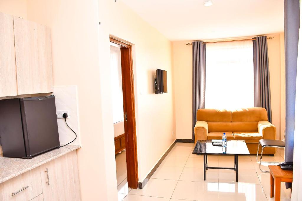 TV a/nebo společenská místnost v ubytování Divine Homes Resort Kisumu