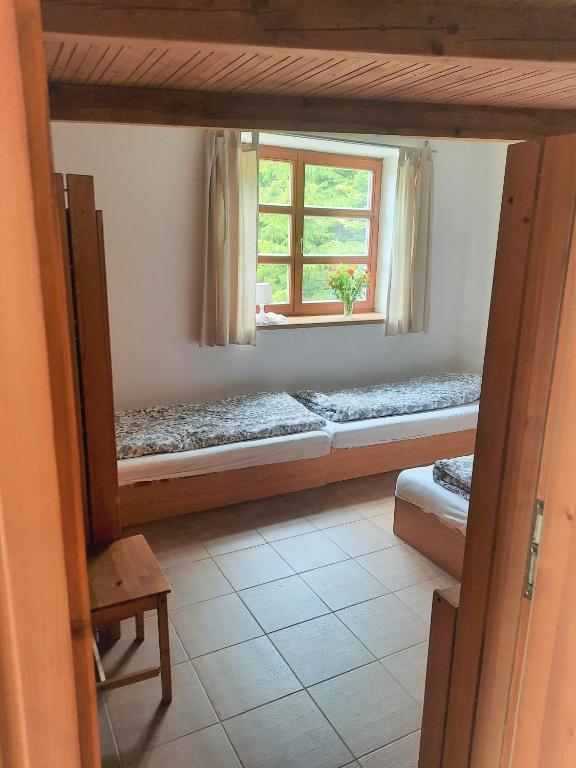 Postel nebo postele na pokoji v ubytování Velký apartmán Cihlarka