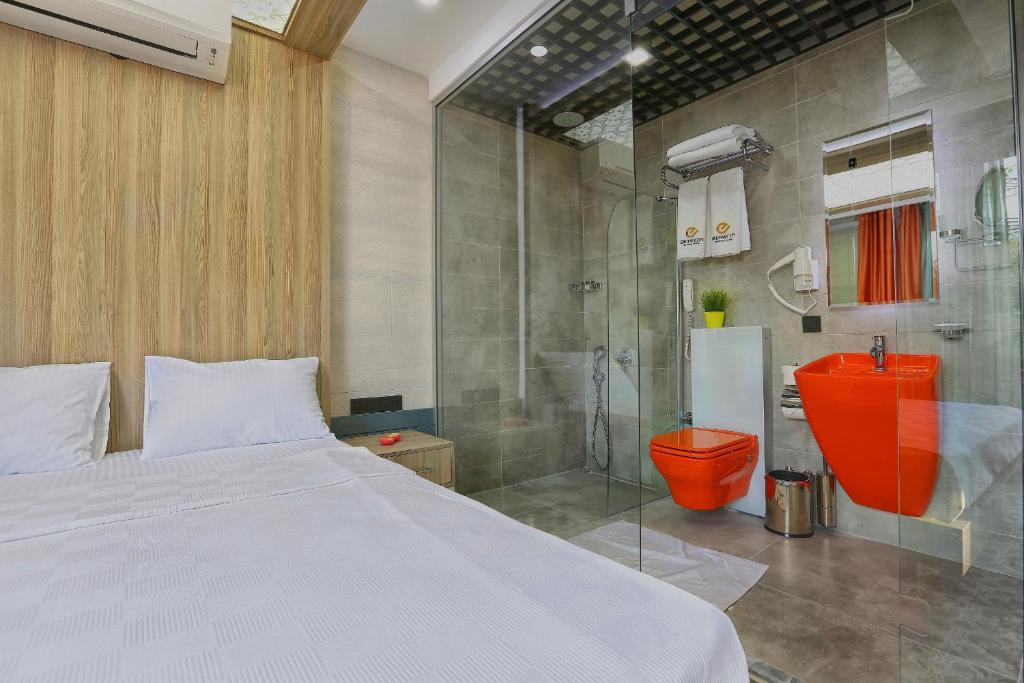 Postel nebo postele na pokoji v ubytování Erdem City Hotel