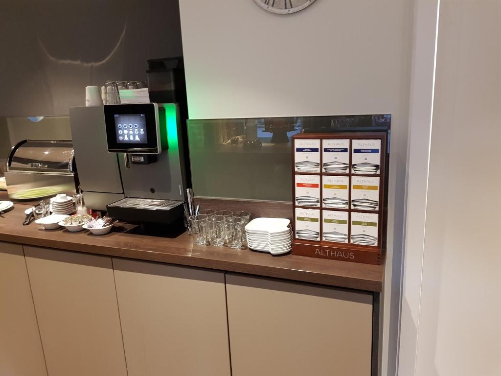 Kuchyň nebo kuchyňský kout v ubytování Rafaela Hotel Heidelberg