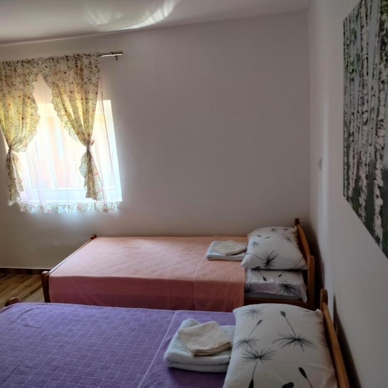 Krevet ili kreveti u jedinici u okviru objekta Vujanac vikend kuća
