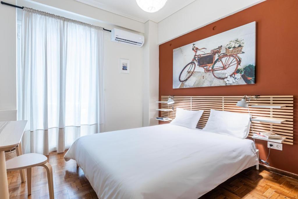 Säng eller sängar i ett rum på Laskareos Apartment by Olala Homes