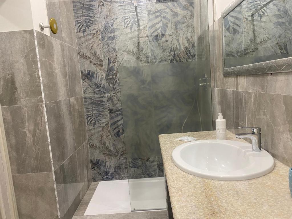 Kúpeľňa v ubytovaní Akoya Rooms Capo Vaticano