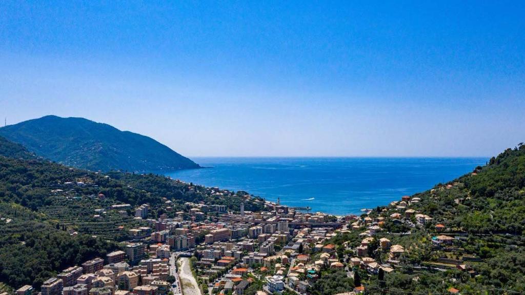 an aerial view of a city and the ocean at Villa Pia Recco in Recco