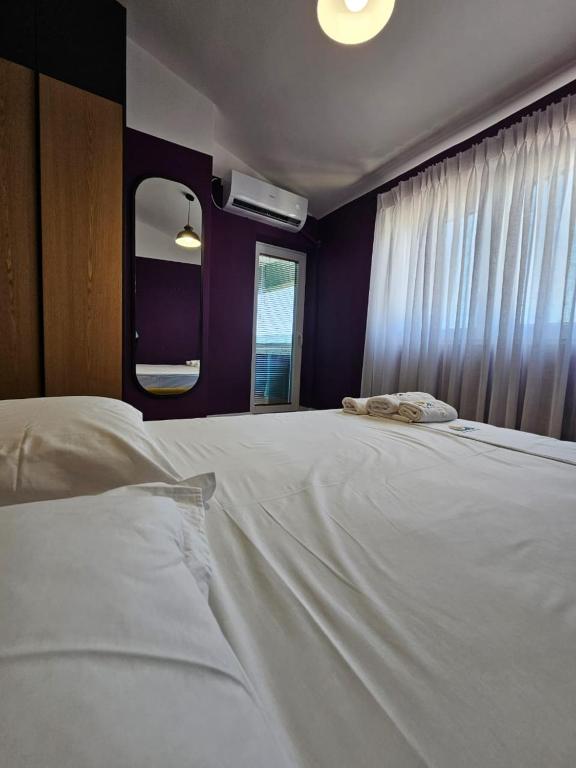Postel nebo postele na pokoji v ubytování Drion Apartment with lake view