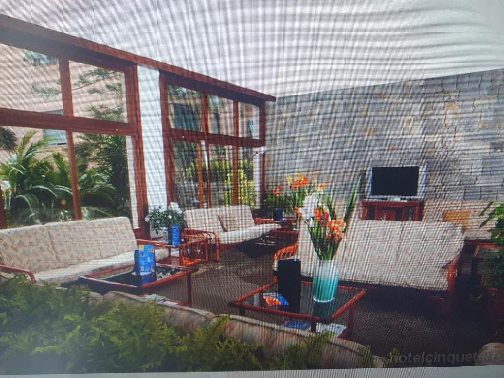 A garden outside Fegina 3 DELuxe Bedrooms & Bathrooms