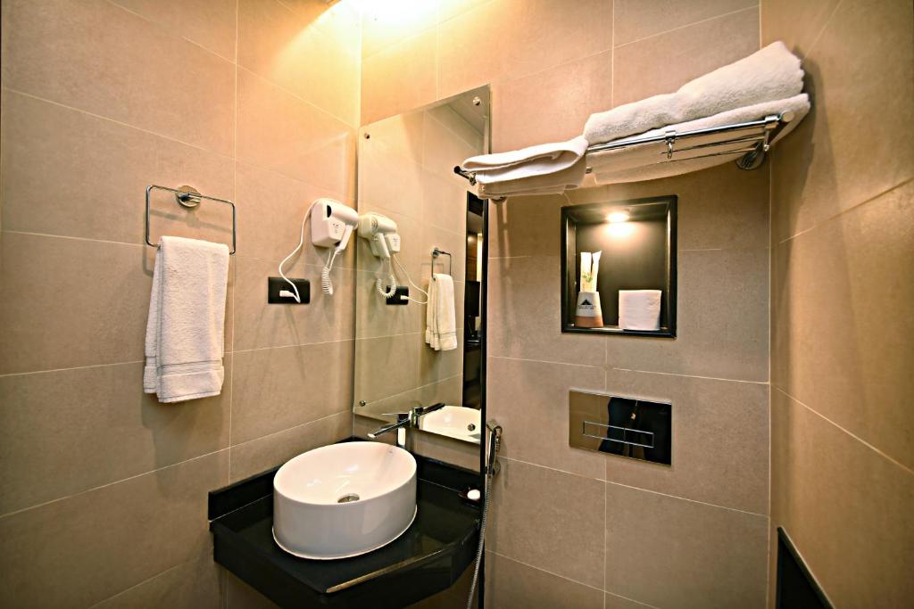 a bathroom with a sink and a toilet in it at Everest Boutique Hotel in Kathmandu