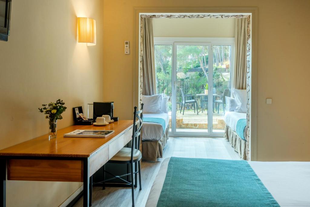 Posezení v ubytování Hotel Hostalillo by Escampa Hotels
