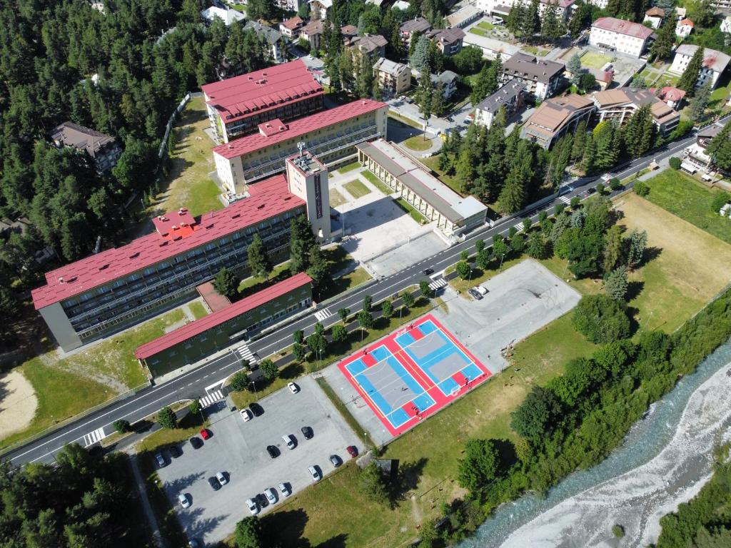 an overhead view of a building with a swimming pool at Villaggio Olimpico in Bardonecchia