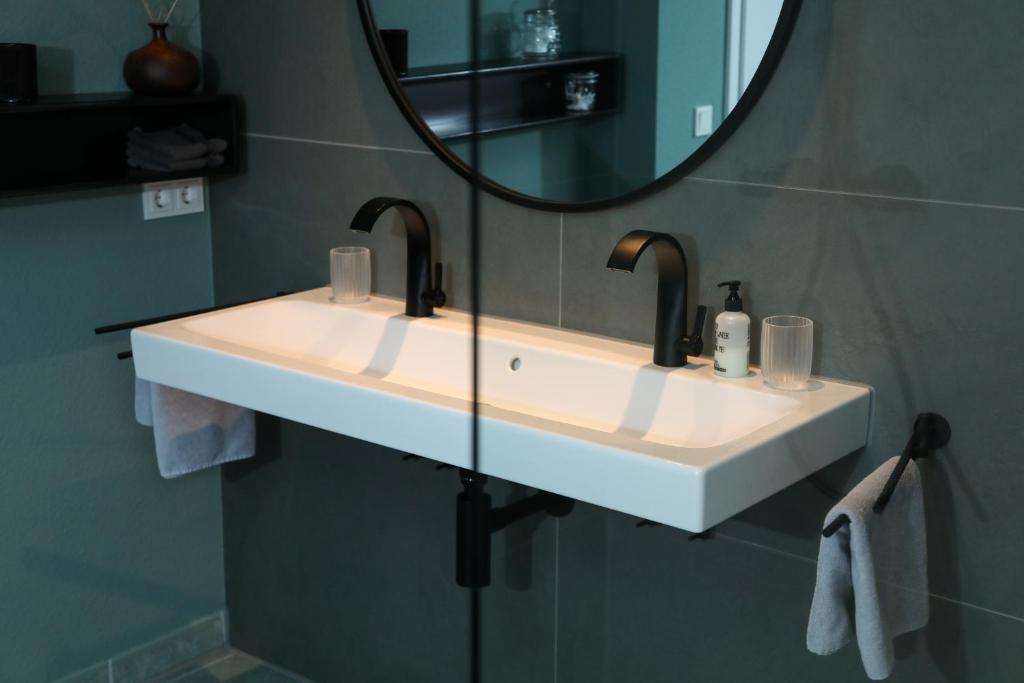 Ein Badezimmer in der Unterkunft Marhold Apartments