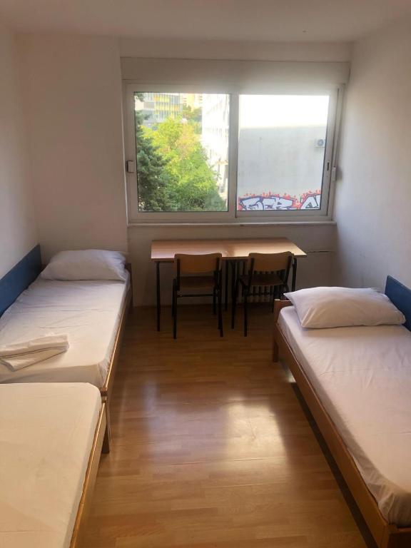 Postel nebo postele na pokoji v ubytování Split Summer Budget Rooms