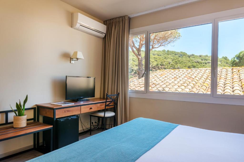 Postel nebo postele na pokoji v ubytování Hotel Hostalillo by Escampa Hotels