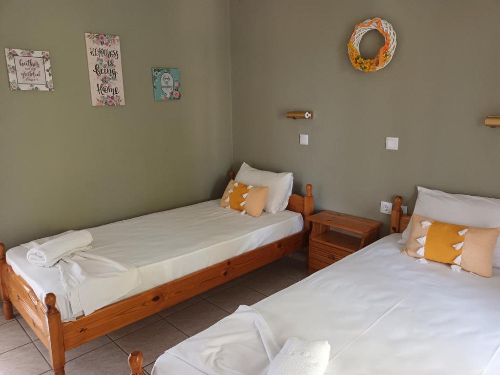 Postel nebo postele na pokoji v ubytování Oasis