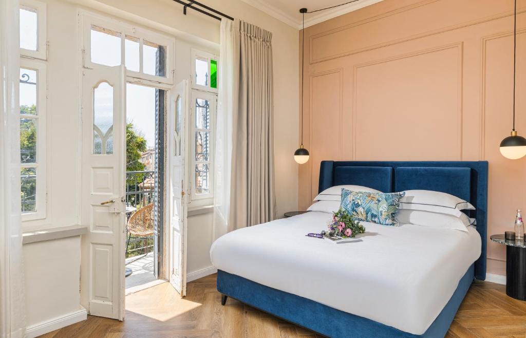 Postel nebo postele na pokoji v ubytování Villa Albi - Machne Yehuda Hotel