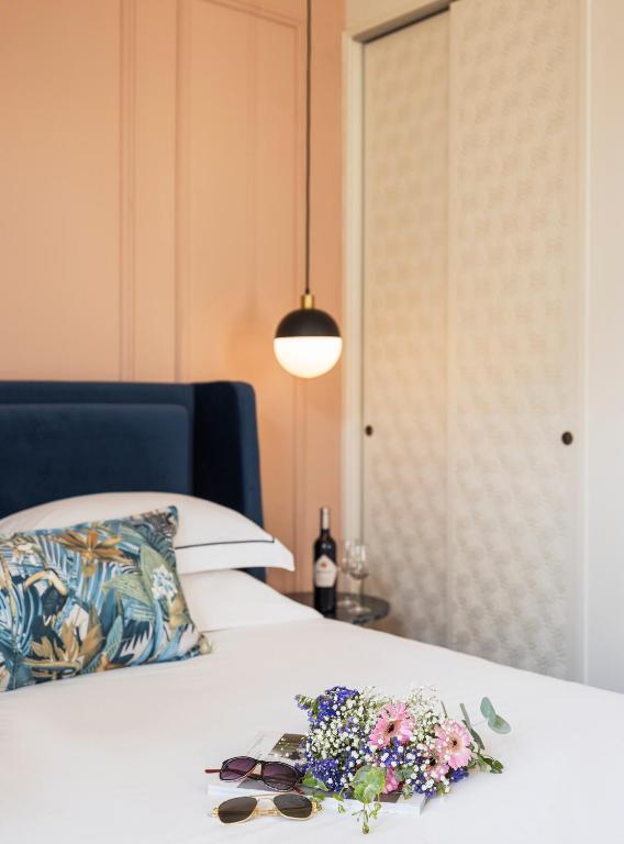 Postel nebo postele na pokoji v ubytování Villa Albi - Machne Yehuda Hotel