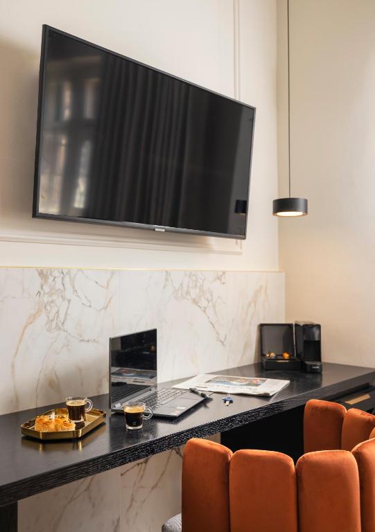 TV a/nebo společenská místnost v ubytování Villa Albi - Machne Yehuda Hotel