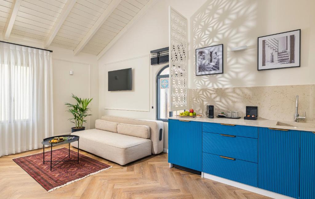 TV a/nebo společenská místnost v ubytování Villa Albi - Machne Yehuda Hotel