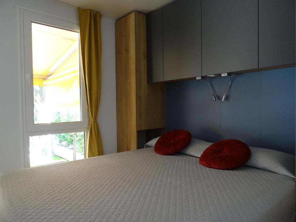 Postel nebo postele na pokoji v ubytování Camping Santin