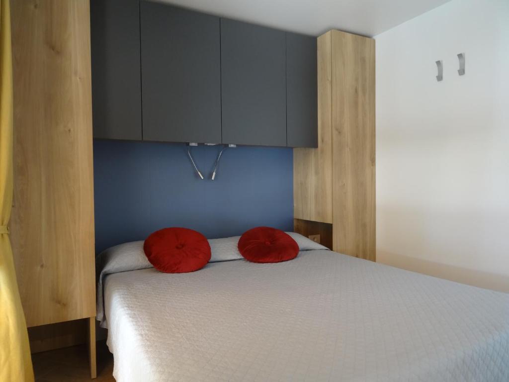Postel nebo postele na pokoji v ubytování Camping Santin