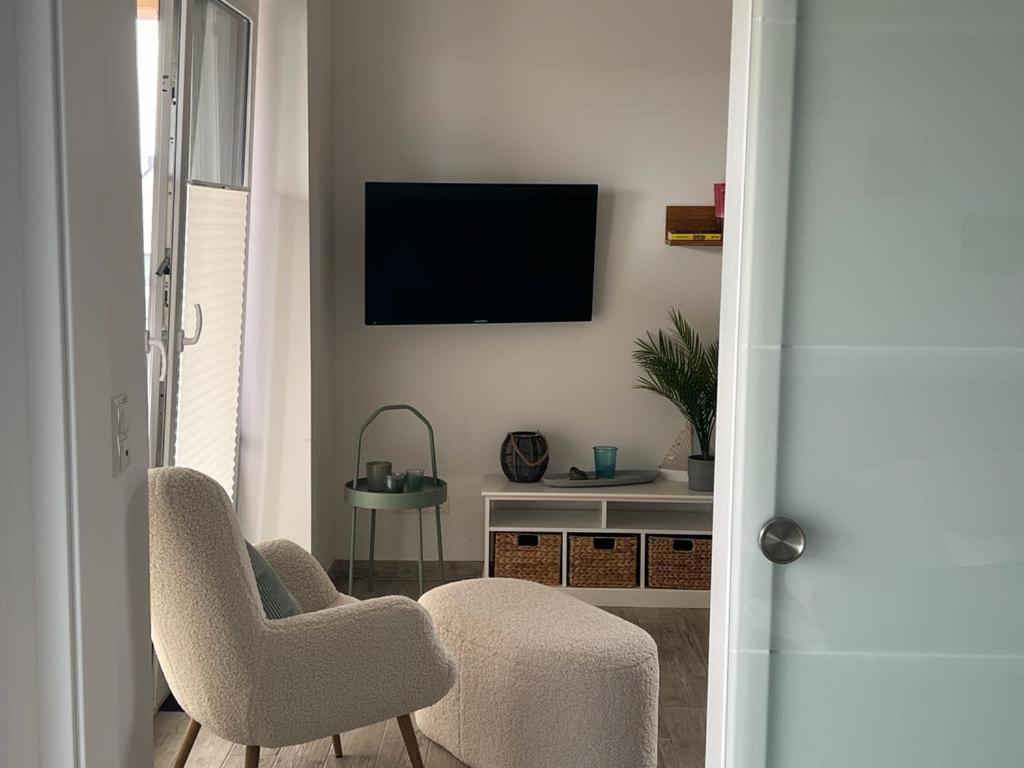 TV a/nebo společenská místnost v ubytování Pearl 7 Nordsee Park Dangast