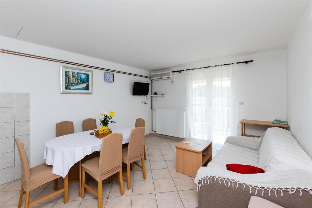 Postel nebo postele na pokoji v ubytování Apartments Boza