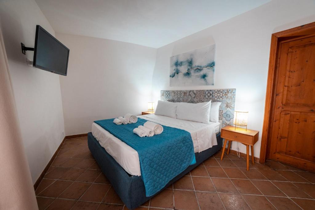 Postel nebo postele na pokoji v ubytování Sicily Home-affittacamere mediterraneo