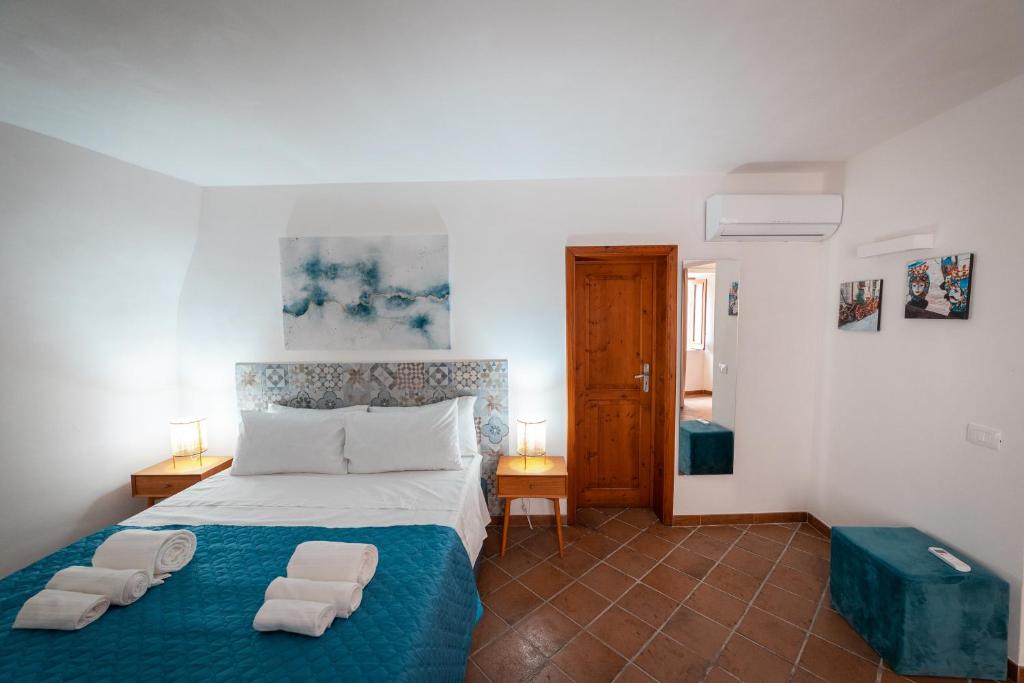 Postel nebo postele na pokoji v ubytování Sicily Home-affittacamere mediterraneo