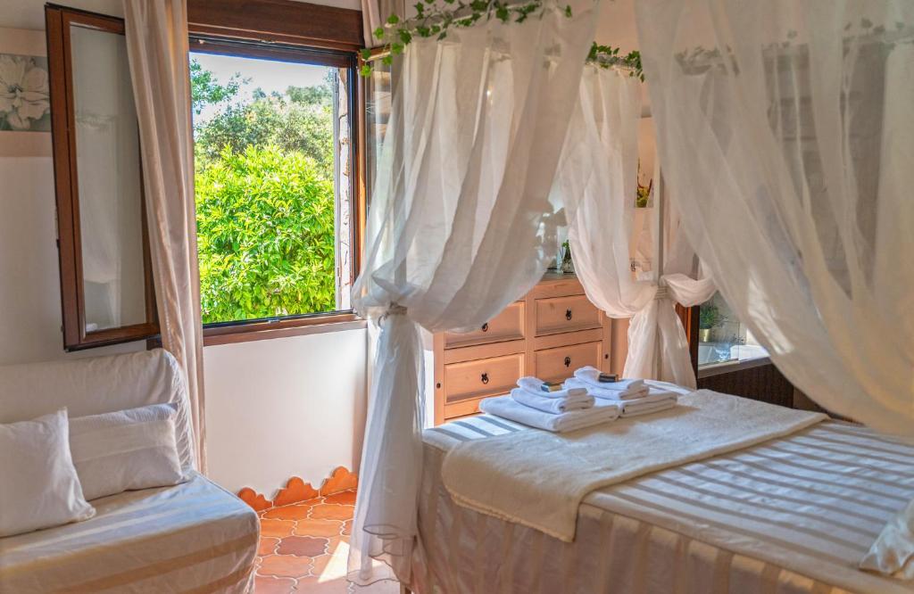 Postel nebo postele na pokoji v ubytování CR El Portezuelo Boutique Experience