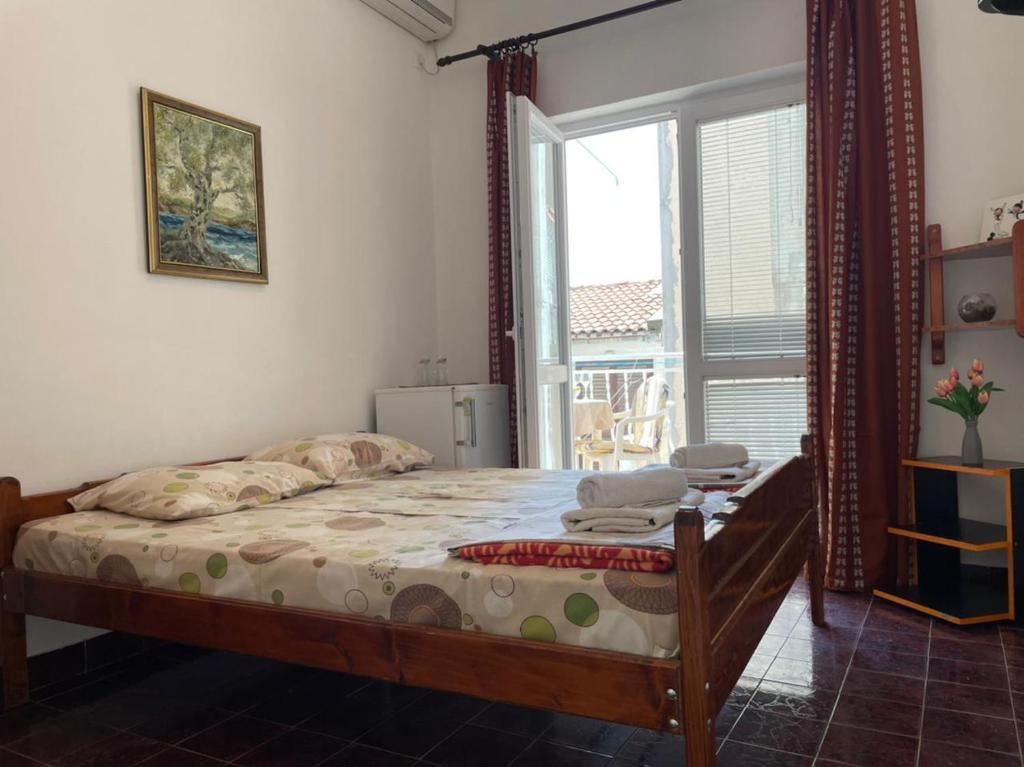 Postel nebo postele na pokoji v ubytování Jelić apartmani
