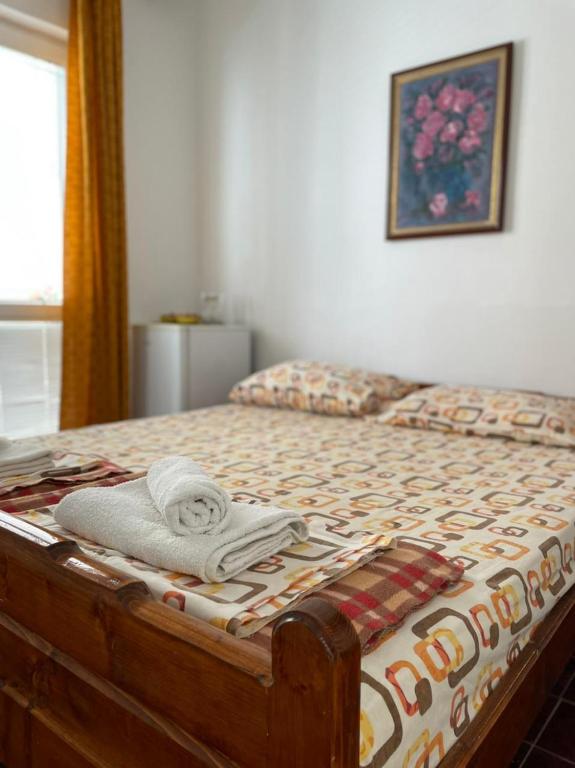 Postel nebo postele na pokoji v ubytování Jelić apartmani