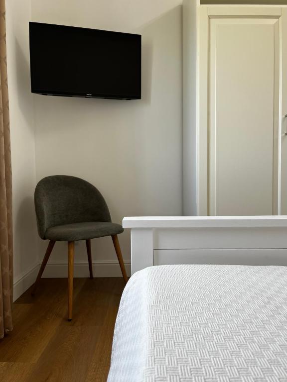 TV a/nebo společenská místnost v ubytování CASADOMA Casa Vacanza - B&B