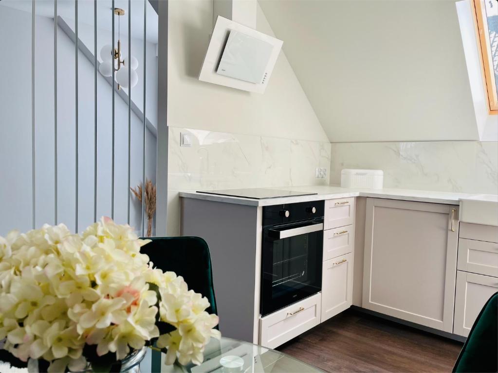 Kuchyň nebo kuchyňský kout v ubytování DeerHome Apartment