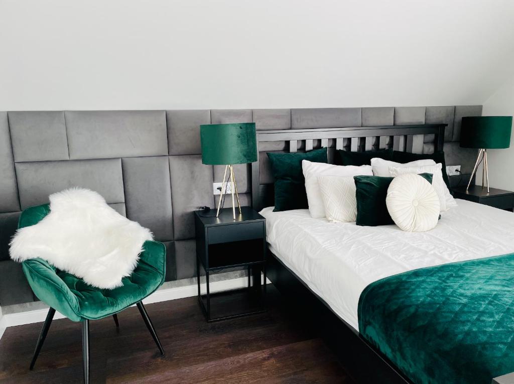 Postel nebo postele na pokoji v ubytování DeerHome Apartment