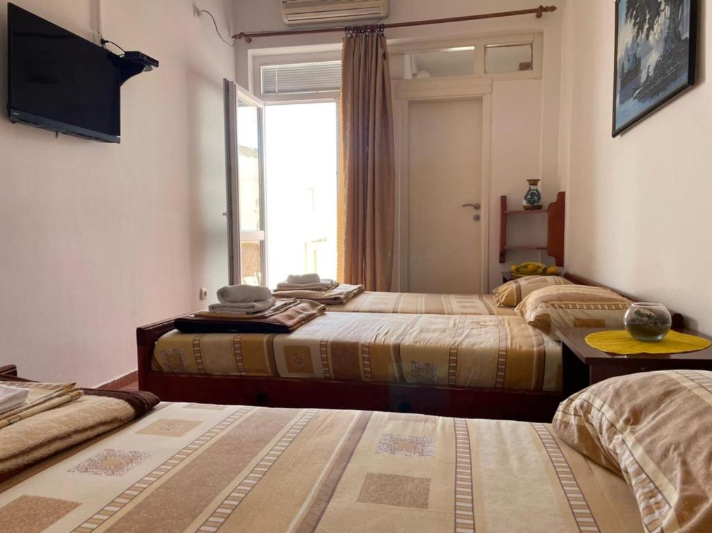 Postel nebo postele na pokoji v ubytování Jelić apartmani