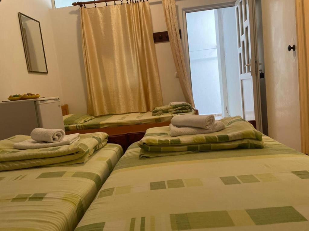 Postel nebo postele na pokoji v ubytování Jelić apartmani