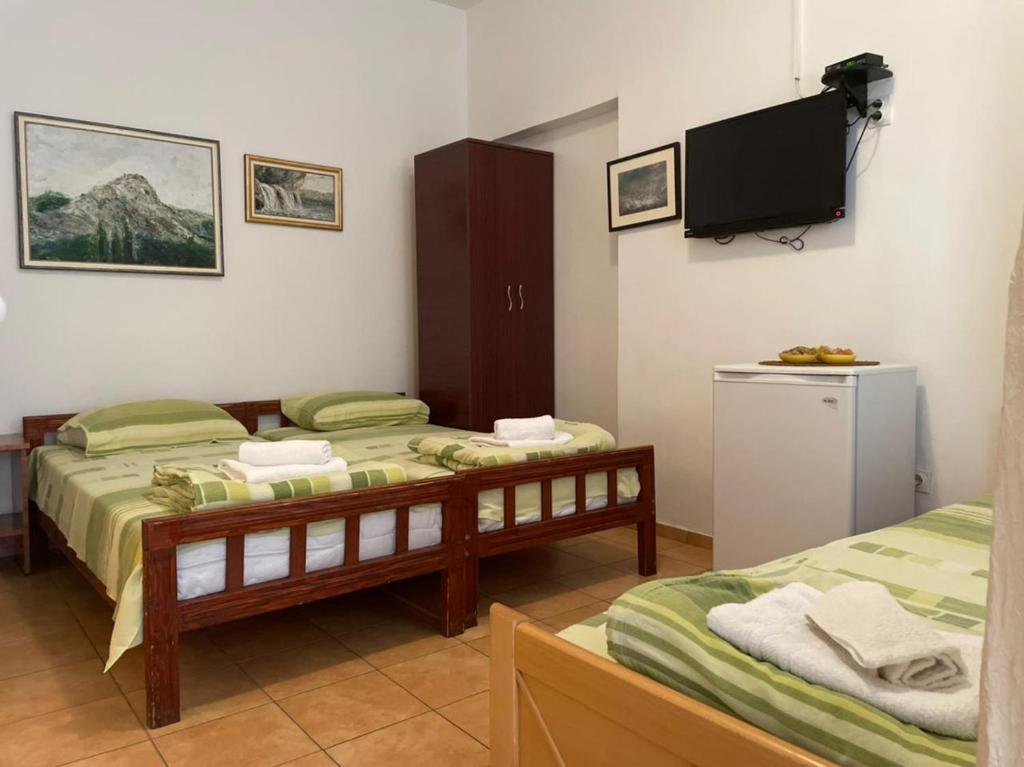 Postel nebo postele na pokoji v ubytování Jelić apartmani