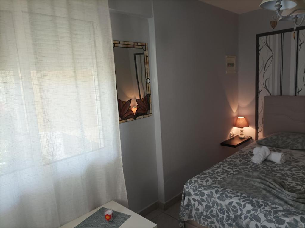 Postel nebo postele na pokoji v ubytování Dimitra Apartments