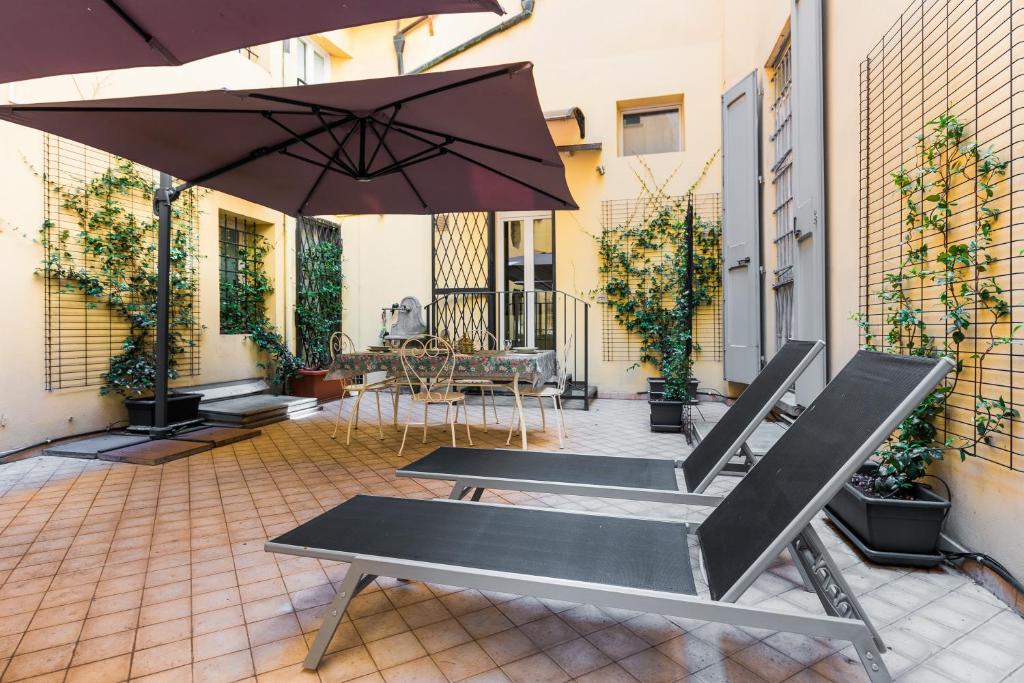 Patio alebo iná vonkajšia časť ubytovania Fossalta Home, in the heart of the Historical Center