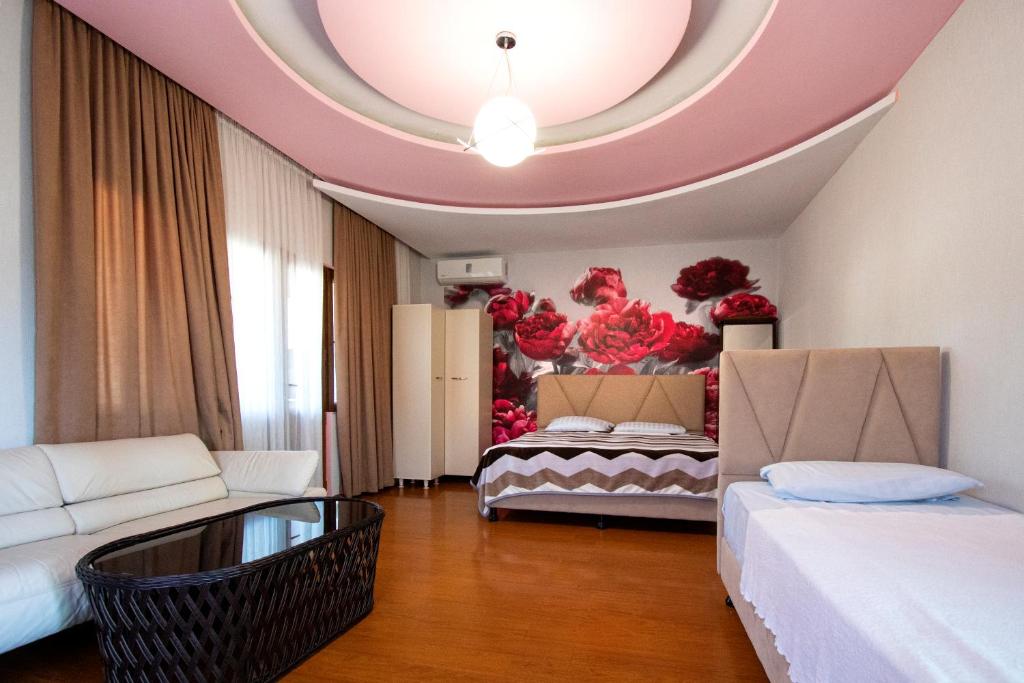 Postel nebo postele na pokoji v ubytování Hotel Smile