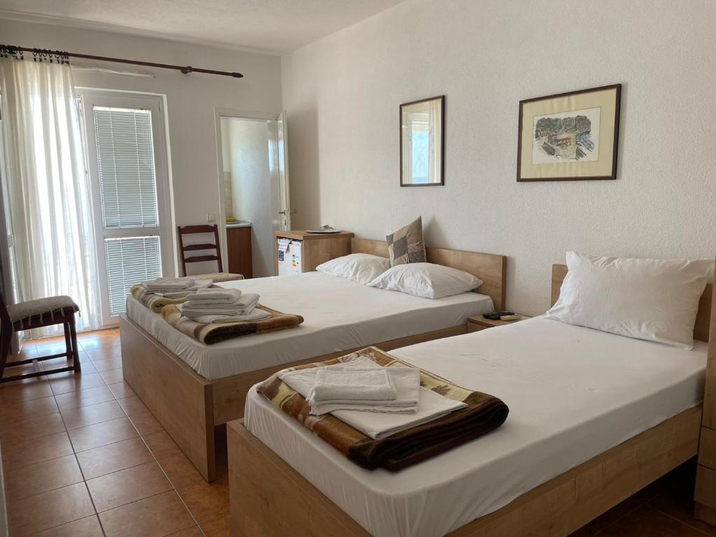 Postel nebo postele na pokoji v ubytování Jelić apartmani