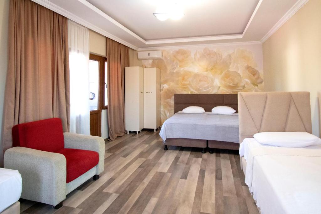Postel nebo postele na pokoji v ubytování Hotel Smile